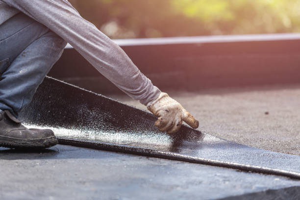 Professional Basement Waterproofing technician working in College Corner, OH